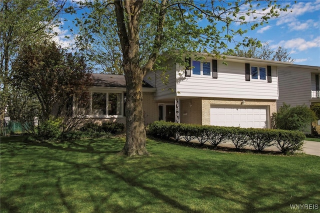 129 Summerview Rd, Amherst, NY 14221 - view of front of property with an attached garage, brick siding, a front yard, and concrete driveway