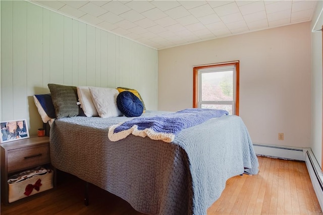 48 Division St, Maryland, NY 12155 - bedroom featuring a baseboard radiator and hardwood / wood-style flooring