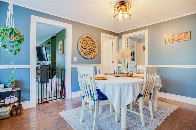 48 Division St, Maryland, NY 12155 - dining area featuring wood finished floors, ornamental molding, and baseboards