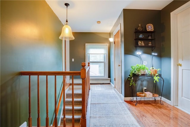 48 Division St, Maryland, NY 12155 - hall featuring wood finished floors and baseboards