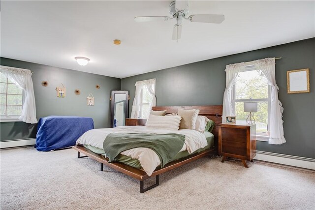 48 Division St, Maryland, NY 12155 - bedroom featuring carpet flooring, multiple windows, and a baseboard radiator