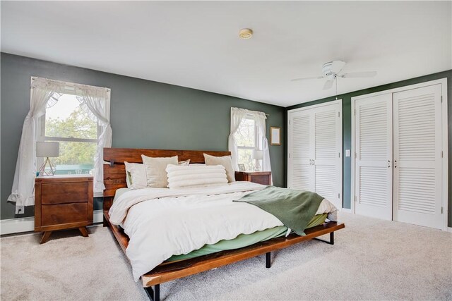 48 Division St, Maryland, NY 12155 - carpeted bedroom with multiple closets, multiple windows, and a ceiling fan
