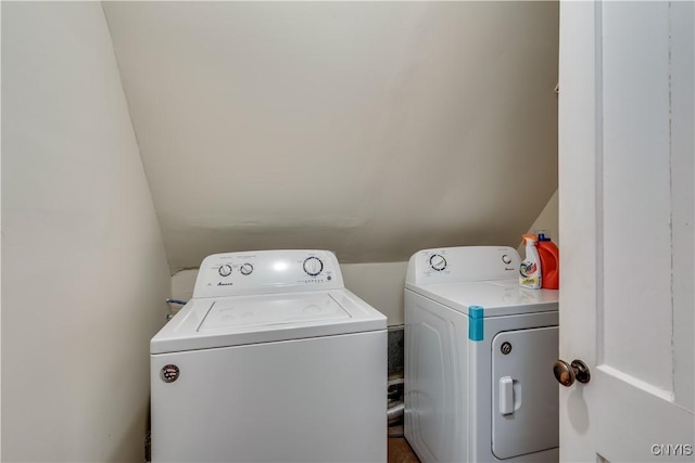 washroom featuring washing machine and dryer