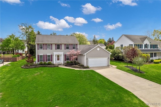 4179 Foxwood Ln, Clarence, NY 14221 - colonial inspired home featuring an attached garage and driveway