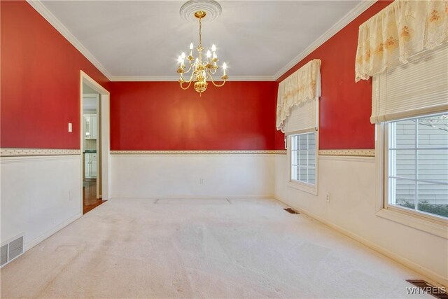 4179 Foxwood Ln, Clarence, NY 14221 - carpeted spare room with a chandelier, crown molding, and baseboards