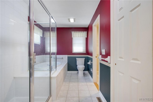 4179 Foxwood Ln, Clarence, NY 14221 - bathroom with a stall shower, a garden tub, toilet, and tile patterned floors