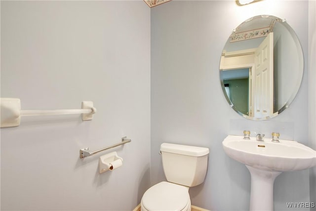 4179 Foxwood Ln, Clarence, NY 14221 - bathroom with toilet and baseboards