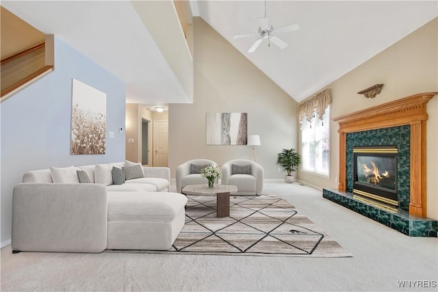 4179 Foxwood Ln, Clarence, NY 14221 - carpeted living room featuring high vaulted ceiling, a premium fireplace, a ceiling fan, and baseboards