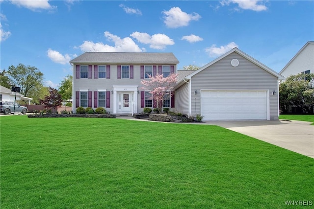 4179 Foxwood Ln, Clarence, NY 14221 - colonial house with a garage, concrete driveway, and a front lawn