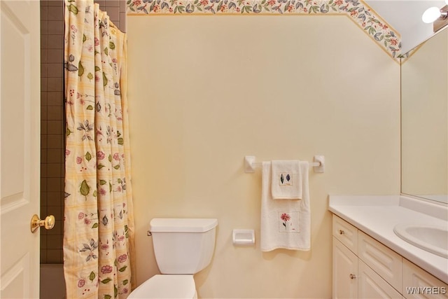 4179 Foxwood Ln, Clarence, NY 14221 - bathroom with toilet, vanity, and shower / tub combo with curtain