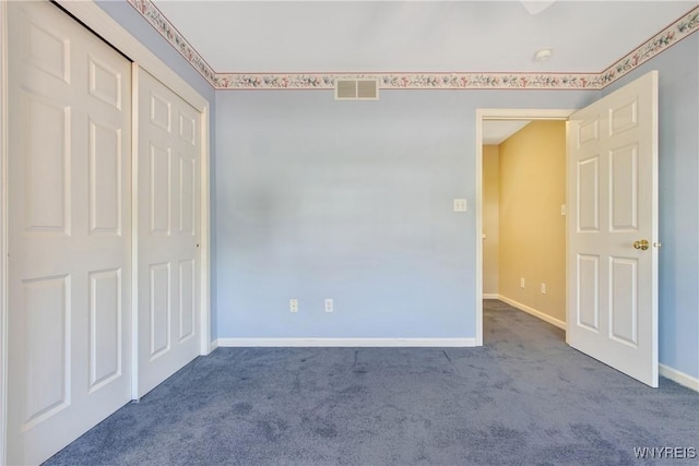 4179 Foxwood Ln, Clarence, NY 14221 - unfurnished bedroom featuring carpet floors, baseboards, and a closet