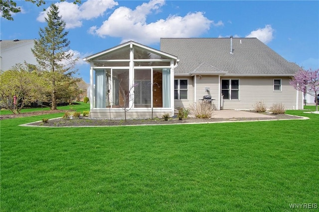 4179 Foxwood Ln, Clarence, NY 14221 - rear view of house featuring a sunroom, a yard, and a patio