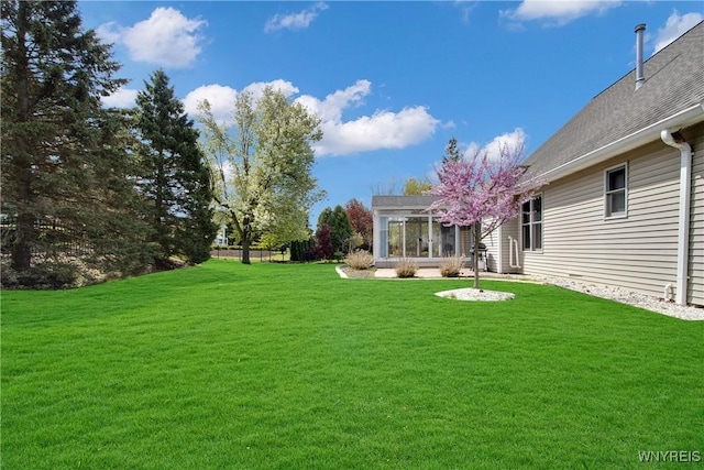 4179 Foxwood Ln, Clarence, NY 14221 - view of green lawn featuring a sunroom