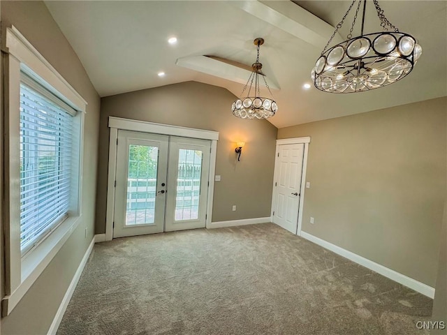 141 Ross Street Ext, Auburn, NY 13021 - entryway with a chandelier, french doors, plenty of natural light, lofted ceiling, and carpet flooring