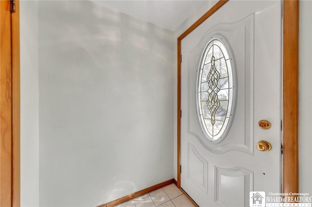 20 Post Rd, Amherst, NY 14221 - foyer featuring light tile patterned flooring and baseboards