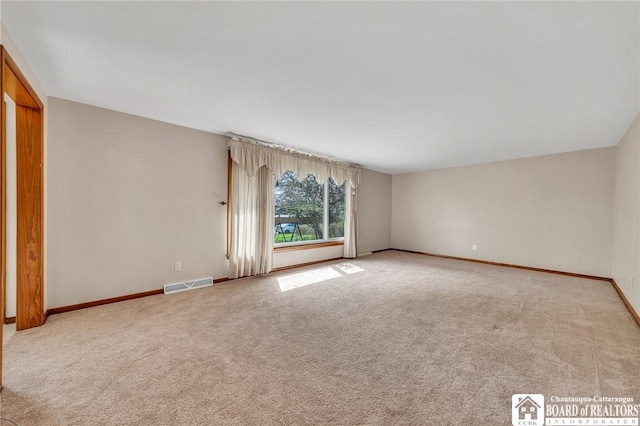 20 Post Rd, Amherst, NY 14221 - carpeted empty room featuring baseboards