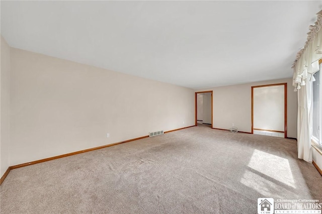 20 Post Rd, Amherst, NY 14221 - carpeted empty room featuring baseboards