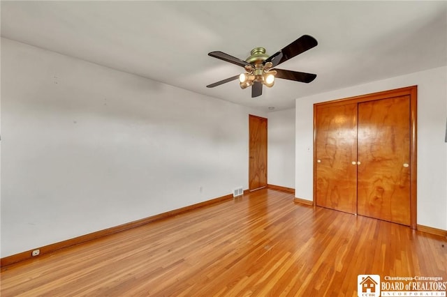 20 Post Rd, Amherst, NY 14221 - unfurnished bedroom with baseboards, light wood-type flooring, and ceiling fan