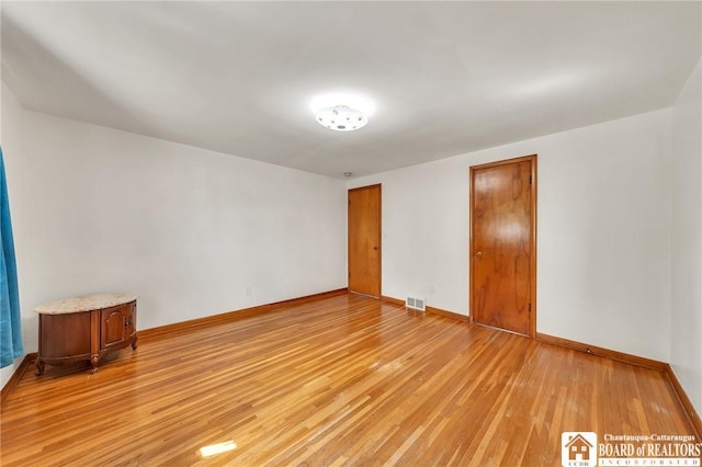20 Post Rd, Amherst, NY 14221 - spare room featuring light wood-type flooring and baseboards