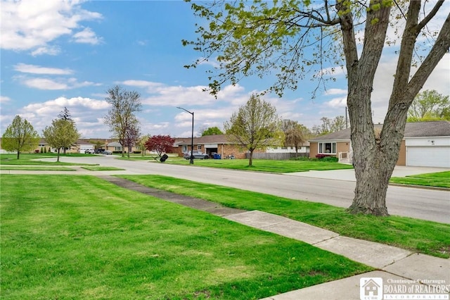 20 Post Rd, Amherst, NY 14221 - view of asphalt street with street lighting, sidewalks, and a residential view