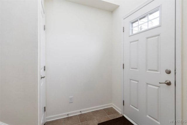 694 Pleasant View Dr, Lancaster, NY 14086 - doorway to outside featuring baseboards