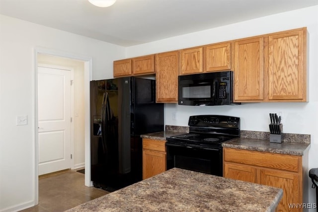694 Pleasant View Dr, Lancaster, NY 14086 - kitchen featuring black appliances and brown cabinetry