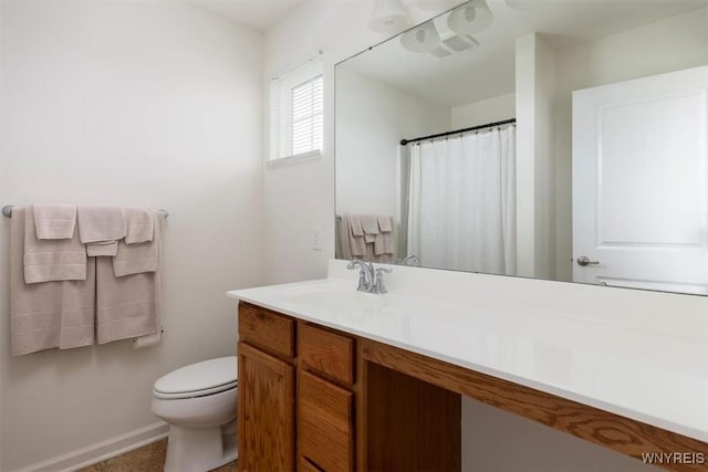 694 Pleasant View Dr, Lancaster, NY 14086 - full bathroom featuring toilet, vanity, baseboards, and a shower with shower curtain