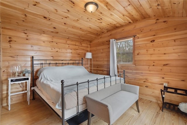 4308 Masternardi Rd, Hector, NY 14818 - bedroom with vaulted ceiling, wood finished floors, wood walls, and wood ceiling