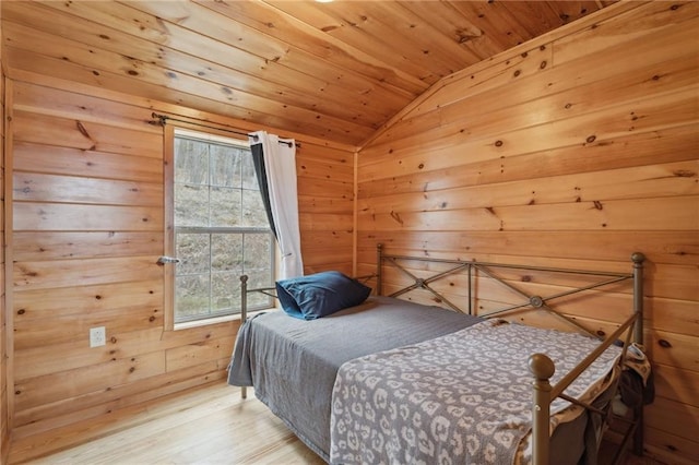 4308 Masternardi Rd, Hector, NY 14818 - bedroom featuring vaulted ceiling, wooden ceiling, wood walls, and wood finished floors