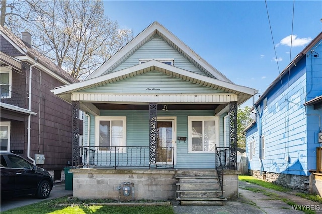 111 Roesch Ave, Buffalo, NY 14207 - shotgun-style home featuring covered porch