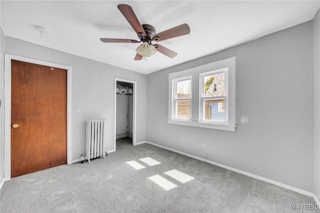 111 Roesch Ave, Buffalo, NY 14207 - unfurnished bedroom with radiator, carpet floors, and baseboards