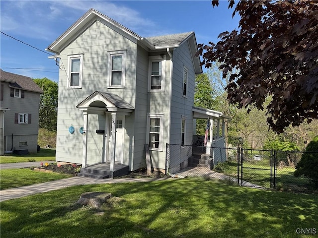 view of front of property featuring a gate