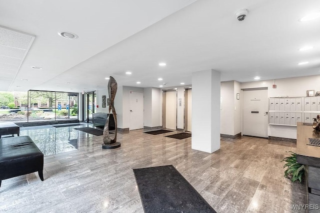849 Delaware Ave Unit 305, Buffalo, NY 14209 - building lobby with expansive windows, a surveillance system, and recessed lighting