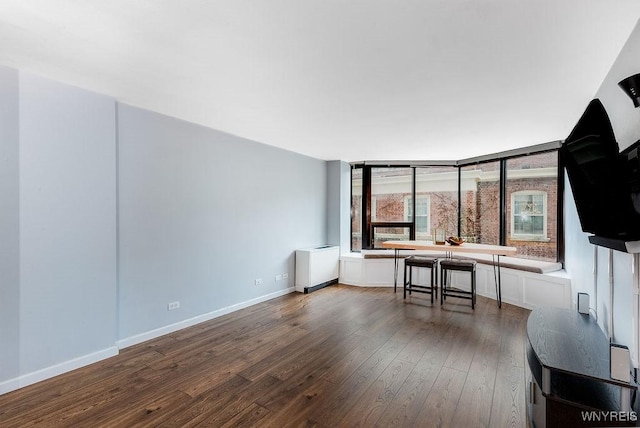 849 Delaware Ave Unit 305, Buffalo, NY 14209 - living area featuring wood finished floors and baseboards