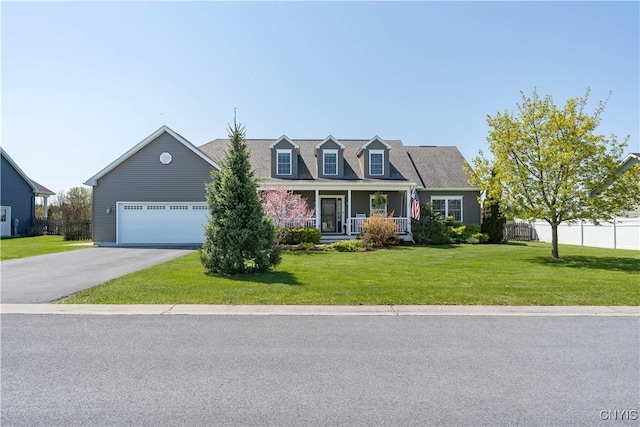 210 Funnycide Dr, Hounsfield, NY 13685 - cape cod-style house featuring driveway, covered porch, and an attached garage