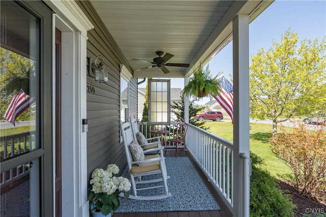 210 Funnycide Dr, Hounsfield, NY 13685 - balcony with a porch and a ceiling fan