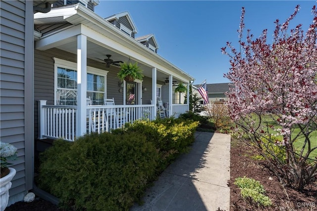 210 Funnycide Dr, Hounsfield, NY 13685 - view of side of home featuring a ceiling fan and a porch
