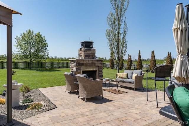 210 Funnycide Dr, Hounsfield, NY 13685 - view of patio featuring an outdoor living space with a fireplace