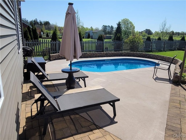 210 Funnycide Dr, Hounsfield, NY 13685 - view of swimming pool featuring a patio area and a fenced backyard