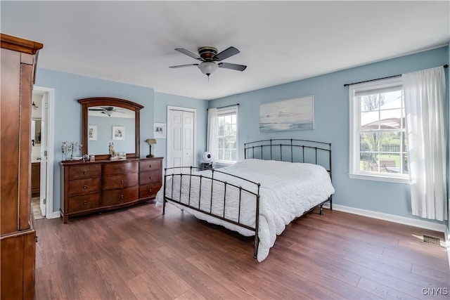 210 Funnycide Dr, Hounsfield, NY 13685 - bedroom featuring baseboards, wood finished floors, a closet, and ceiling fan