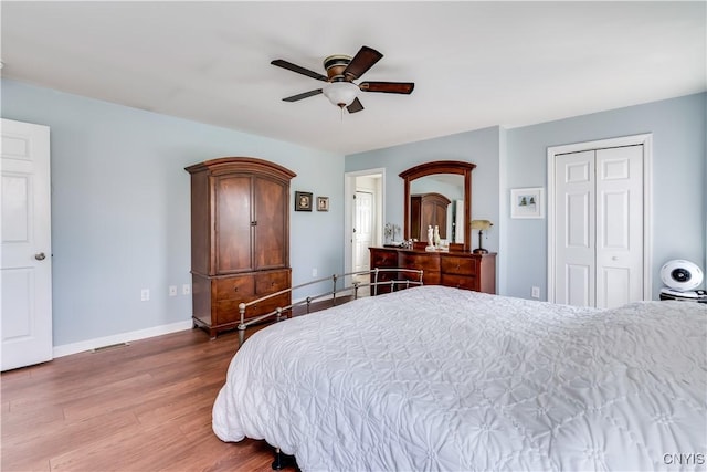 210 Funnycide Dr, Hounsfield, NY 13685 - bedroom featuring wood finished floors, baseboards, a closet, and ceiling fan