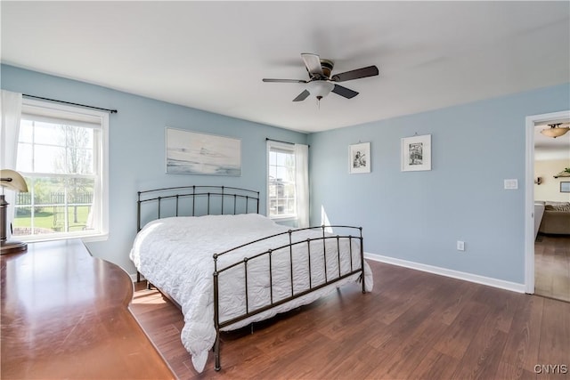 210 Funnycide Dr, Hounsfield, NY 13685 - bedroom featuring wood finished floors, ceiling fan, and baseboards