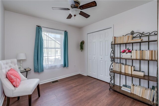 210 Funnycide Dr, Hounsfield, NY 13685 - sitting room featuring a ceiling fan, dark wood finished floors, and baseboards