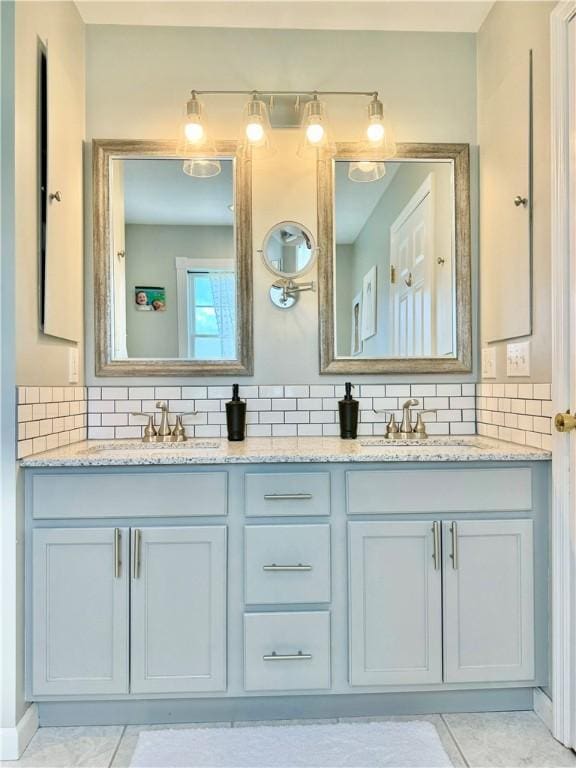 214 Fairfield Dr, Horseheads, NY 14845 - bathroom featuring decorative backsplash and double vanity