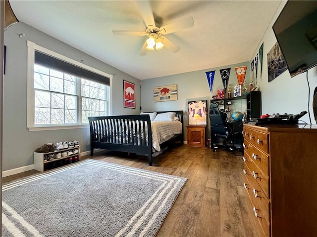 214 Fairfield Dr, Horseheads, NY 14845 - bedroom with wood finished floors, an office area, and a ceiling fan