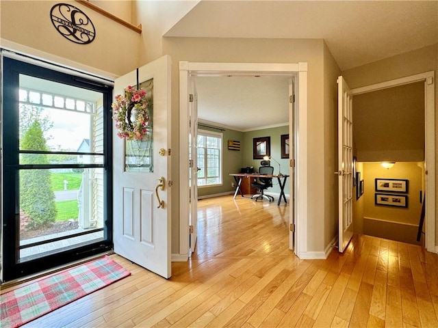 214 Fairfield Dr, Horseheads, NY 14845 - entryway with light wood finished floors, baseboards, and crown molding