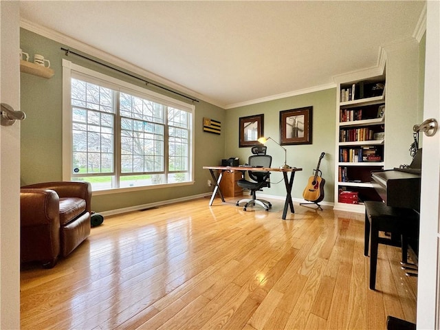 214 Fairfield Dr, Horseheads, NY 14845 - home office featuring ornamental molding, baseboards, light wood finished floors, and built in features