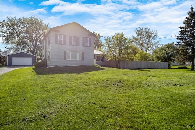 view of property exterior with a garage and an outdoor structure