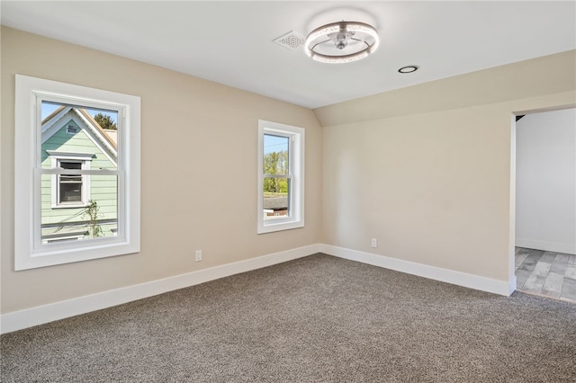 339 W Bank St, Albion, NY 14411 - spare room with plenty of natural light, carpet flooring, baseboards, and lofted ceiling