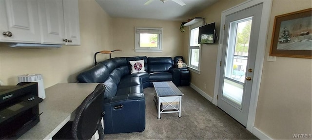 72 Ebenezer Dr Rear, Rear, West Seneca, NY 14224 - living room featuring healthy amount of natural light, a ceiling fan, carpet flooring, and baseboards